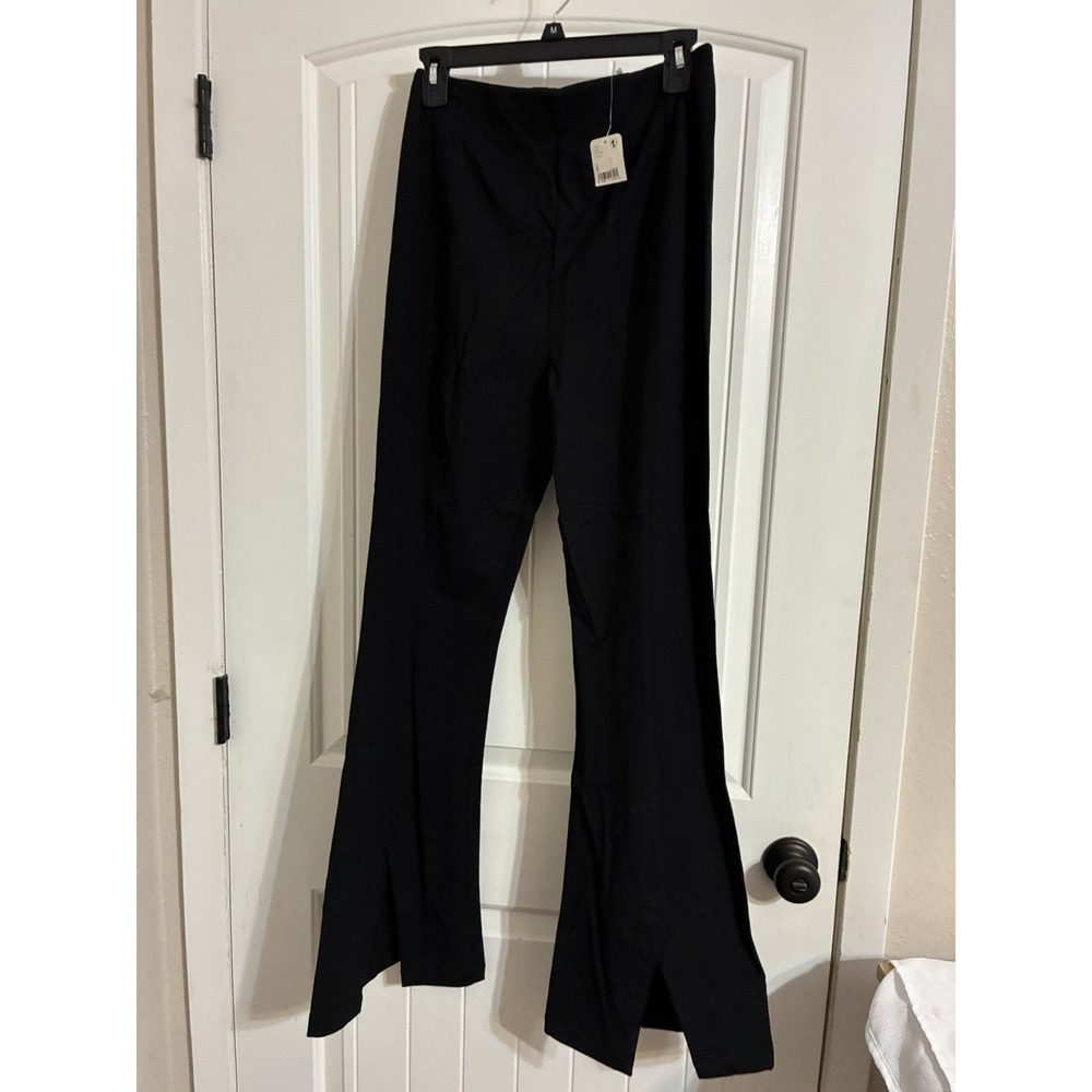 Free People OB1324256 Women's The Real Deal Slit Flare Pants in Black. Size M.